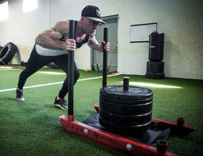 How to Use Power Sled Training for Strongman