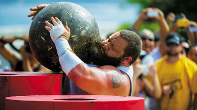 What Is The Difference Between Strongman And Powerlifting?