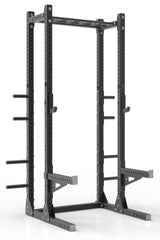 111 black powder coated steel home gym half rack with multi grip pull up bar, safety arms, rear extension for weight plates storage and j-cups from iron bull strength