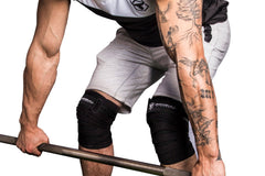 black knee wraps protects during deadlift