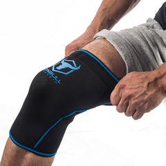 black-blue knee support sleeves how to put on